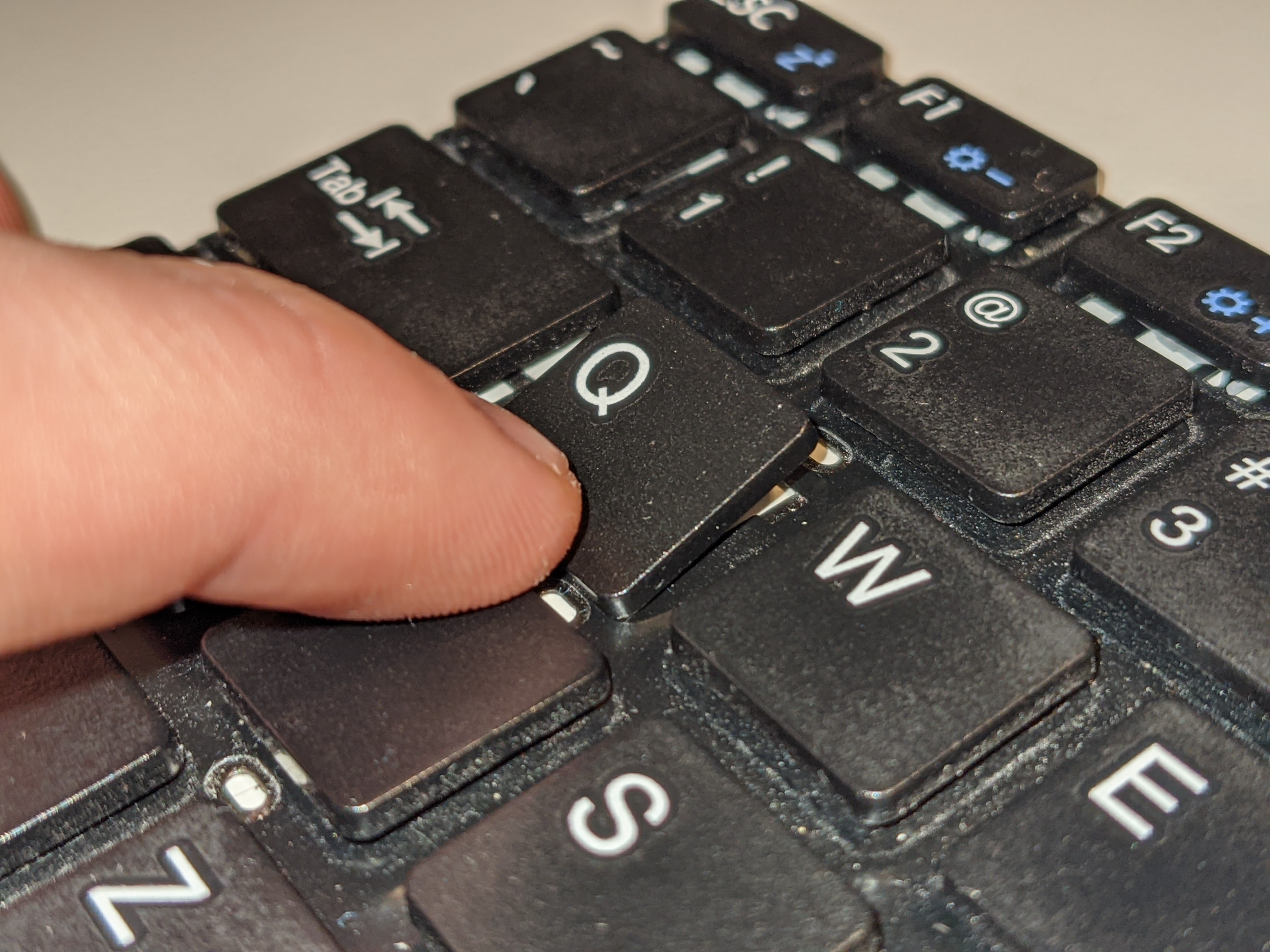 Pinebookpro keyboard key-half-removed.jpg